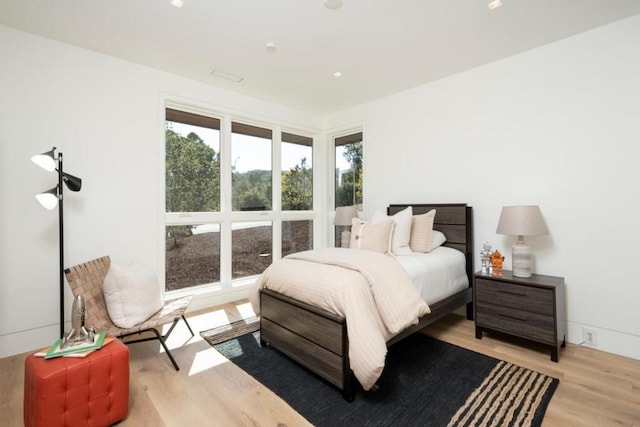 bedroom featuring light hardwood / wood-style flooring