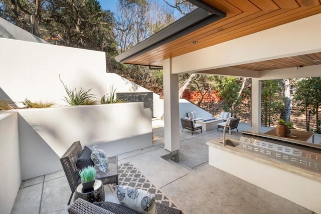 view of patio / terrace featuring area for grilling and an outdoor living space