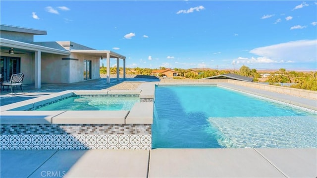 view of pool featuring an in ground hot tub and a patio area