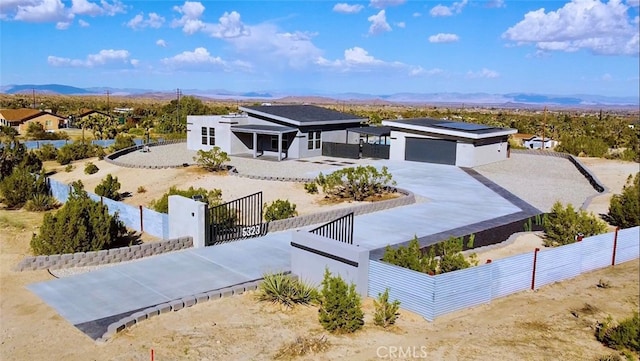 view of front of home with a mountain view