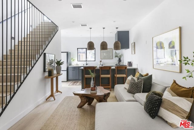 living room featuring light wood-type flooring