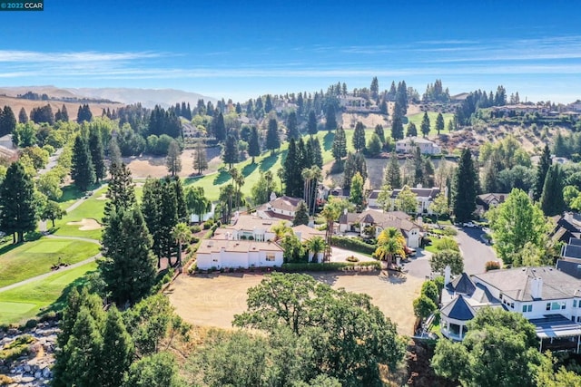 birds eye view of property with a mountain view