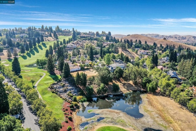 bird's eye view with a water and mountain view