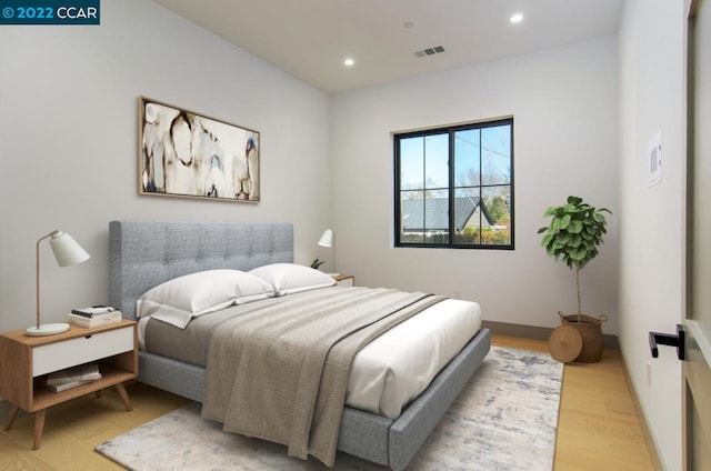 bedroom featuring light hardwood / wood-style flooring