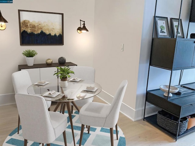 dining room featuring light hardwood / wood-style floors