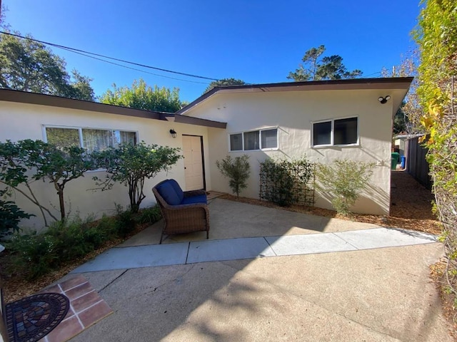 rear view of property with a patio area