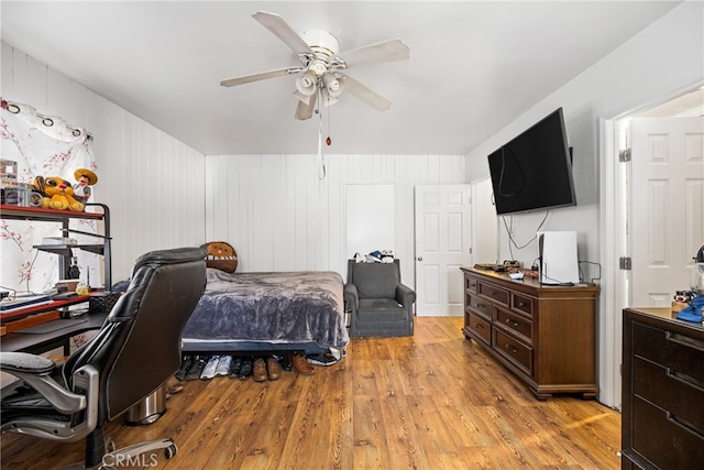 bedroom featuring ceiling fan and light wood-type flooring