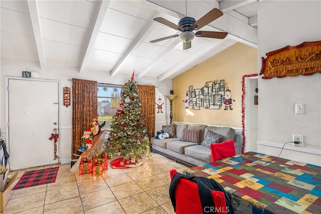 tiled living room with ceiling fan and lofted ceiling with beams