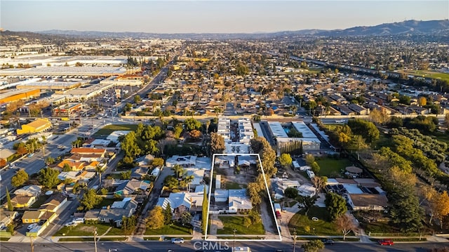 drone / aerial view featuring a mountain view