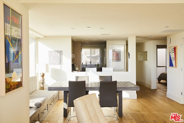 dining room featuring light hardwood / wood-style floors