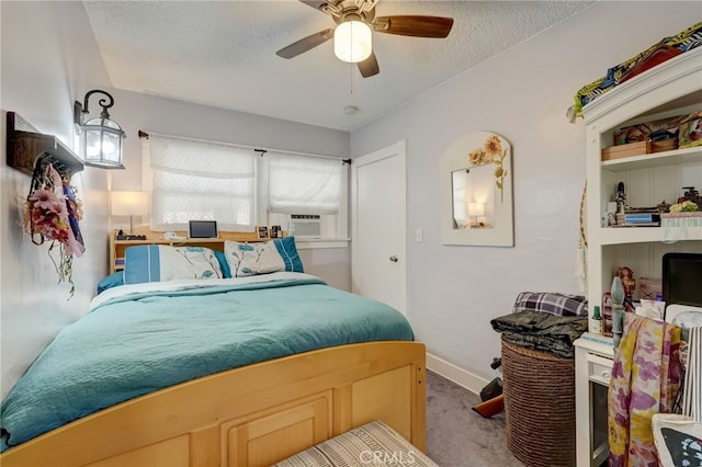 817 E Palmyra Ave, Orange, CA 92866 - bedroom with carpet, a textured ceiling, baseboards, a ceiling fan, and cooling unit