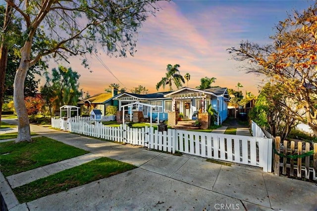 817 E Palmyra Ave, Orange, CA 92866 - view of front of house featuring a fenced front yard and a gate