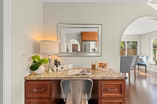 interior space with vanity and wood-type flooring