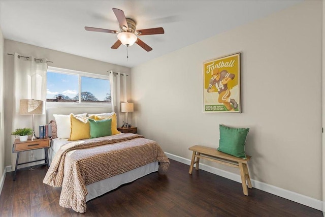 bedroom featuring ceiling fan and dark hardwood / wood-style floors