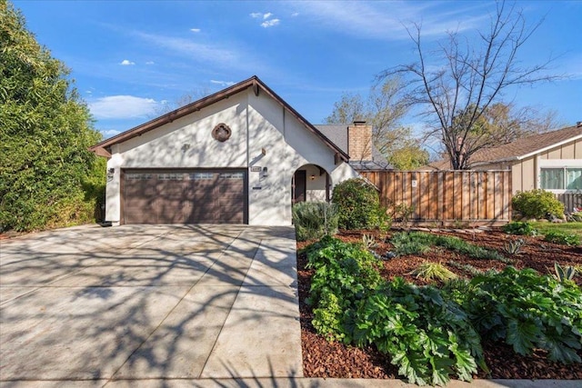 view of front of home featuring a garage