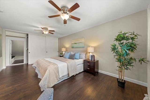 bedroom featuring ceiling fan and dark hardwood / wood-style flooring