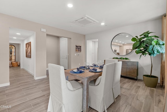 dining room featuring light hardwood / wood-style flooring