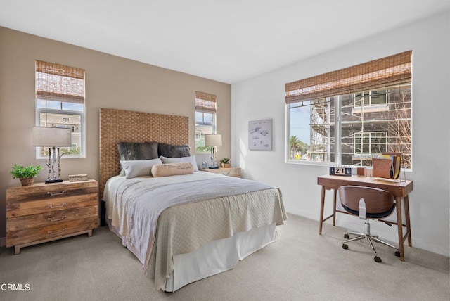 bedroom with light carpet