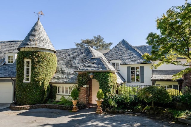 view of front of property featuring a garage