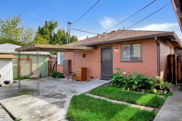 view of front of property with a patio