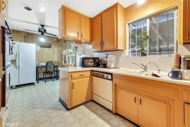 kitchen featuring ceiling fan, white appliances, sink, and light tile floors