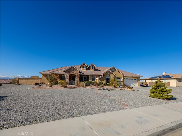 single story home with a garage