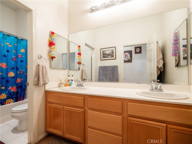 full bathroom with tile patterned flooring, vanity, shower / bath combo, and toilet