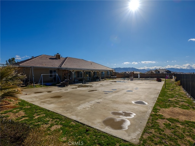 view of patio / terrace featuring a mountain view