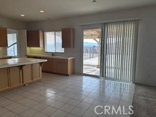 kitchen with light tile patterned floors