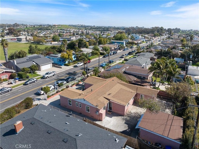birds eye view of property with a residential view