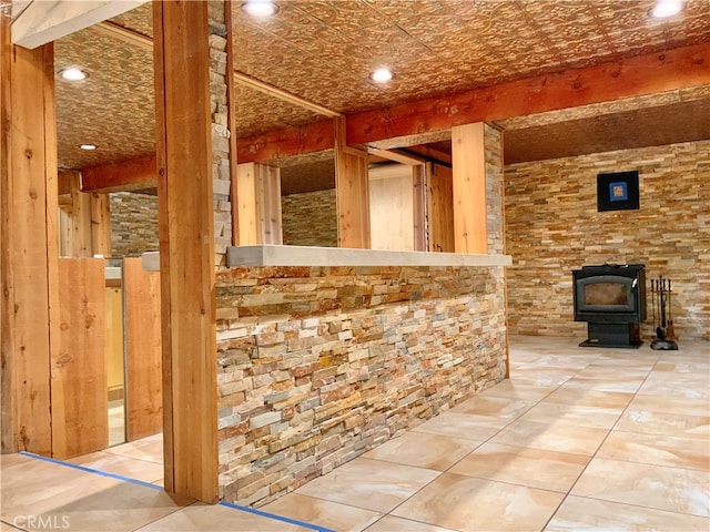 interior space featuring a wood stove