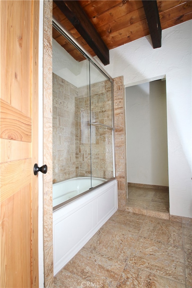 bathroom featuring beam ceiling, bath / shower combo with glass door, and wood ceiling