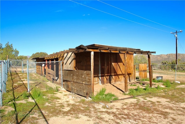 view of outdoor structure featuring a mountain view