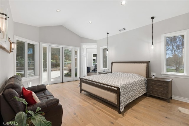 bedroom with french doors, lofted ceiling, light hardwood / wood-style flooring, and access to outside