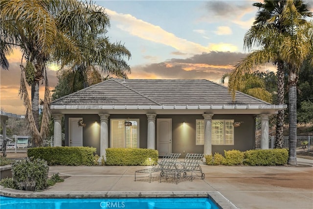 exterior space with a patio area and an outdoor structure