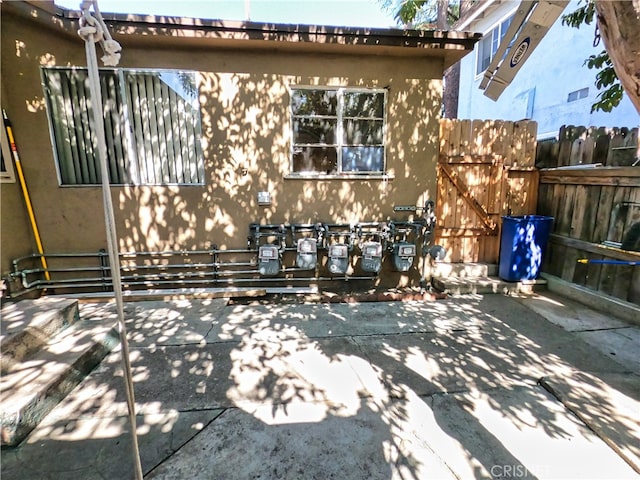 view of property exterior featuring a patio area