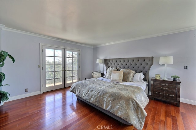 bedroom with french doors, crown molding, and dark wood-type flooring