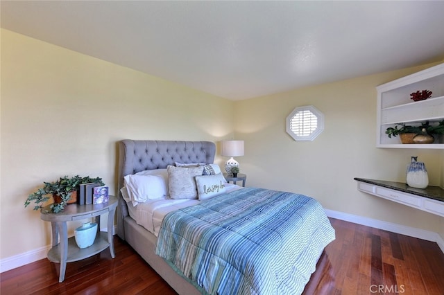 bedroom featuring dark wood-type flooring