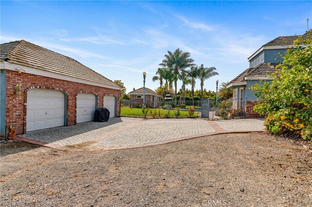 view of yard with a garage