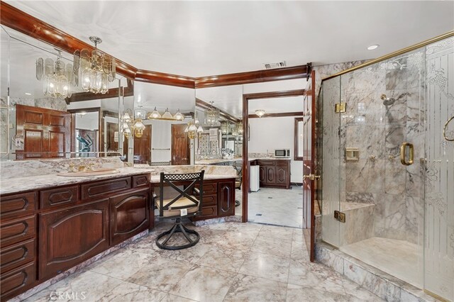 bathroom featuring vanity and walk in shower