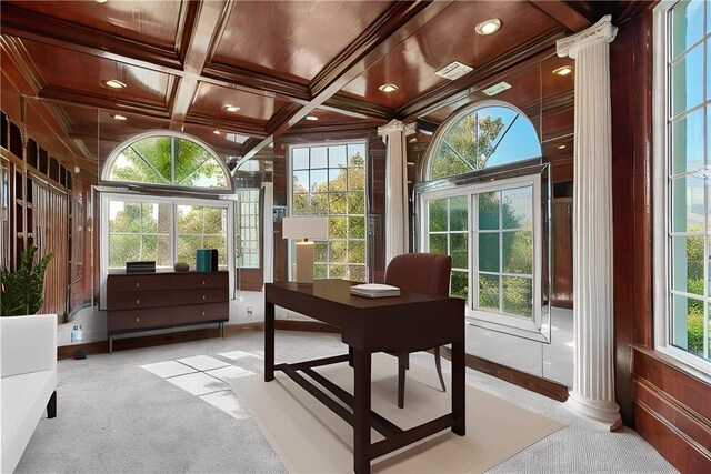 office area featuring beam ceiling, coffered ceiling, decorative columns, light carpet, and ornamental molding