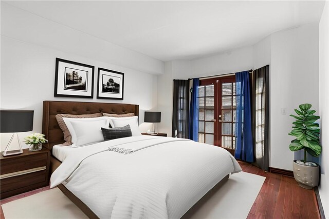 bedroom with french doors and dark hardwood / wood-style flooring