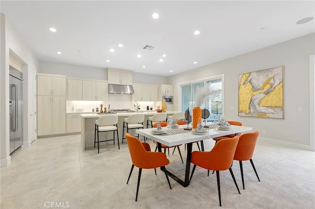 dining space with sink