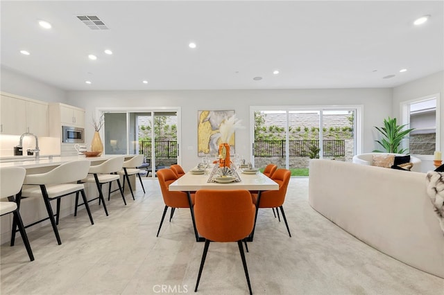 dining room featuring sink