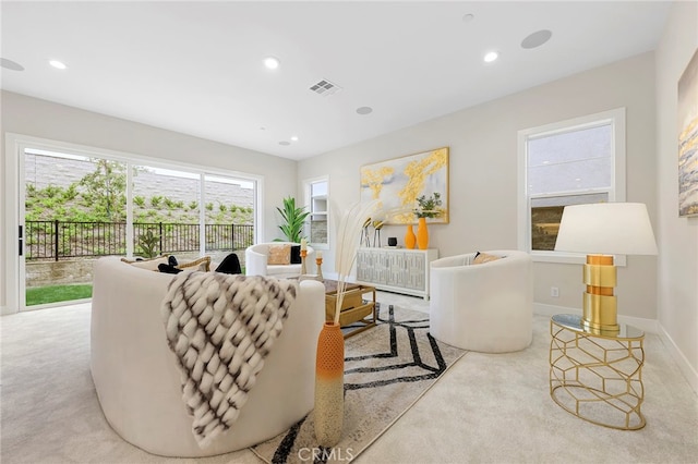 living room with light colored carpet