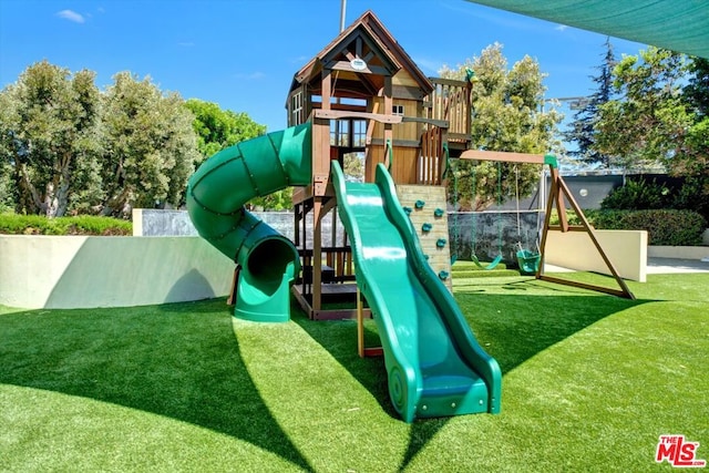 view of play area featuring a yard