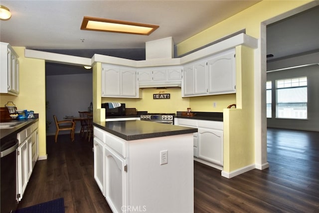 kitchen with white cabinets, lofted ceiling, and dark wood-type flooring