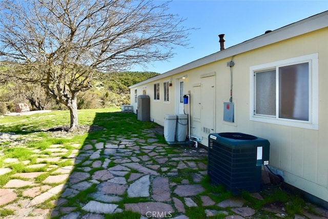 view of yard with central AC