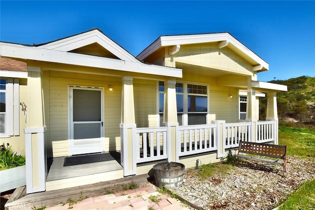 view of front of property featuring covered porch