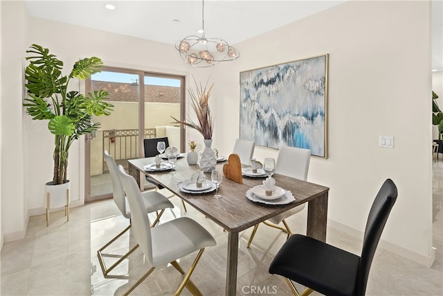 tiled dining space featuring a notable chandelier